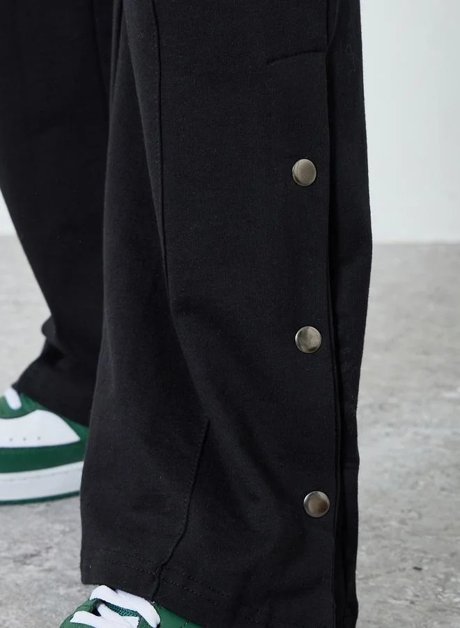 Styli Men Black Embroidered Oversized Joggers